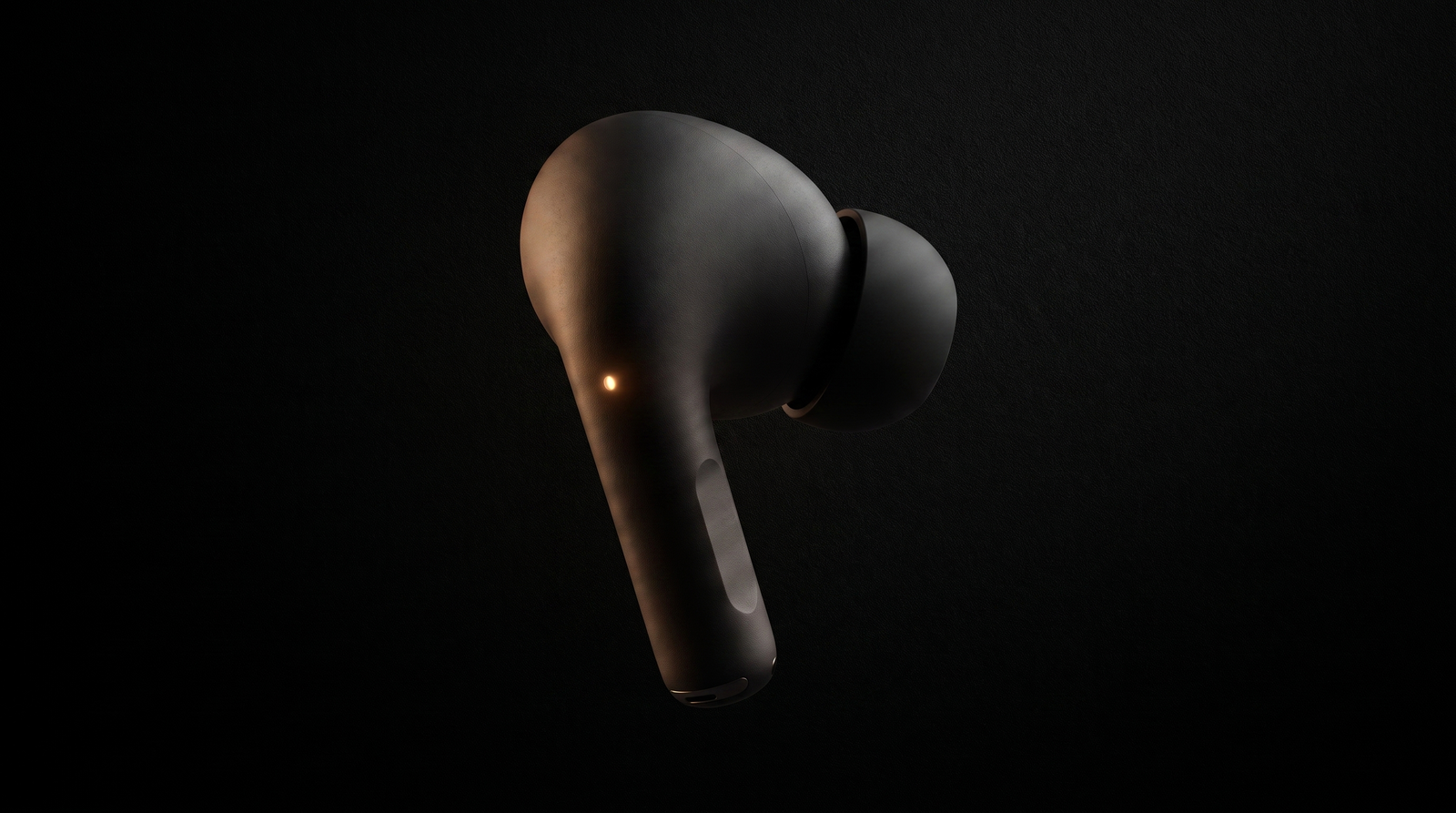 Close-up of Cyrano earbud with glowing indicator